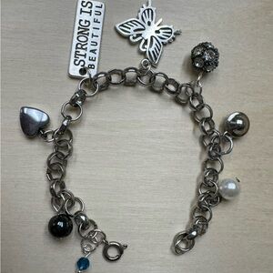 Silver Charm Bracelet Made with Mixed Charms Made From Repurposed Jewelry